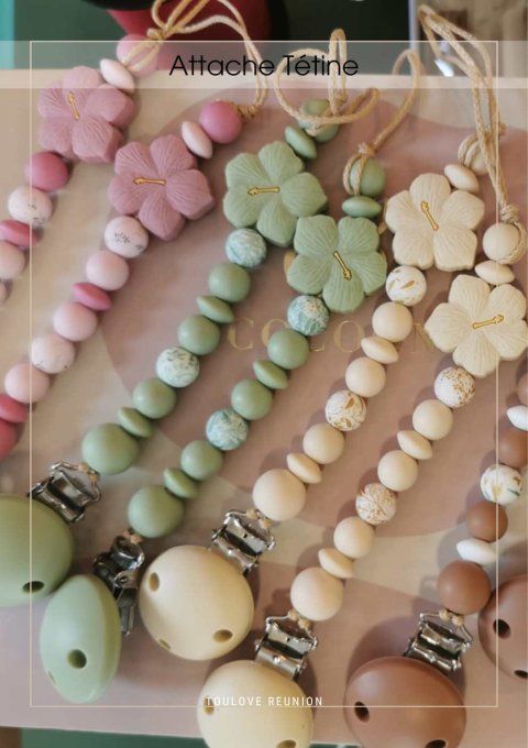 Attache-tétine en silicone “Hibiscus”